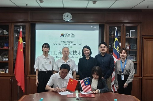 广工商大与新纪元大学签署合作备忘录.jpg